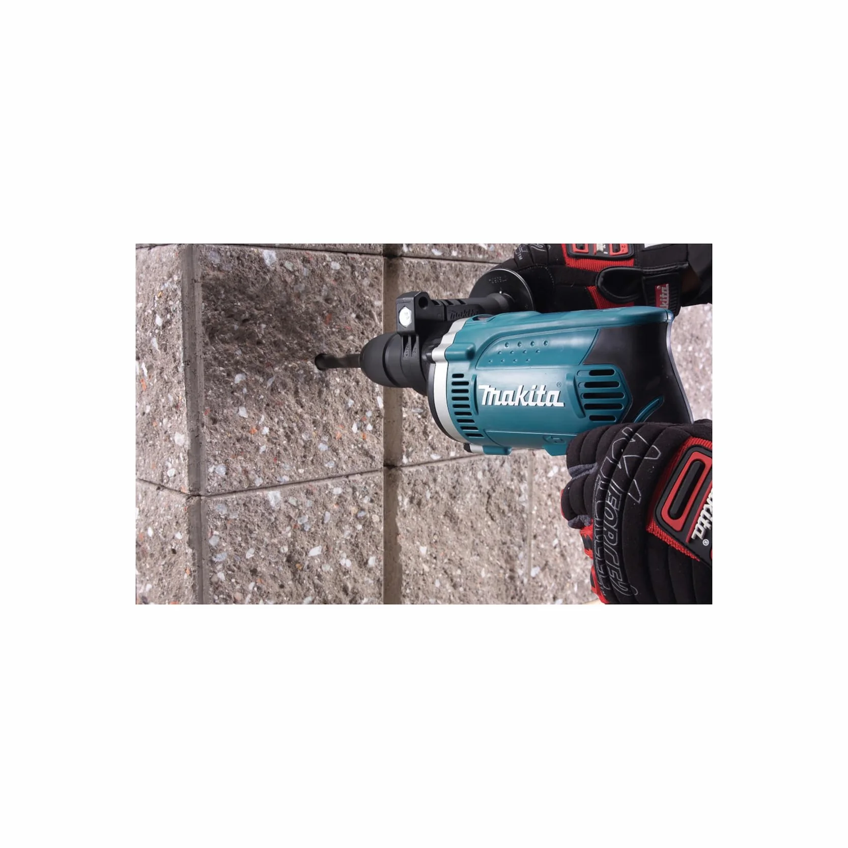 Makita HP1631K - Taladro Percutor 710W 1.9 Kg 3200 Rpm Portabrocas Auto