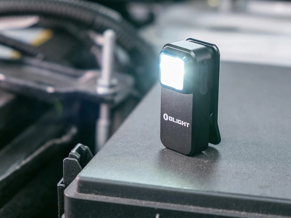 OLIGHT Oclip Linterna ángulo Recto Bicicleta, 300 LM, Luz Blanca y roja (Negra)
