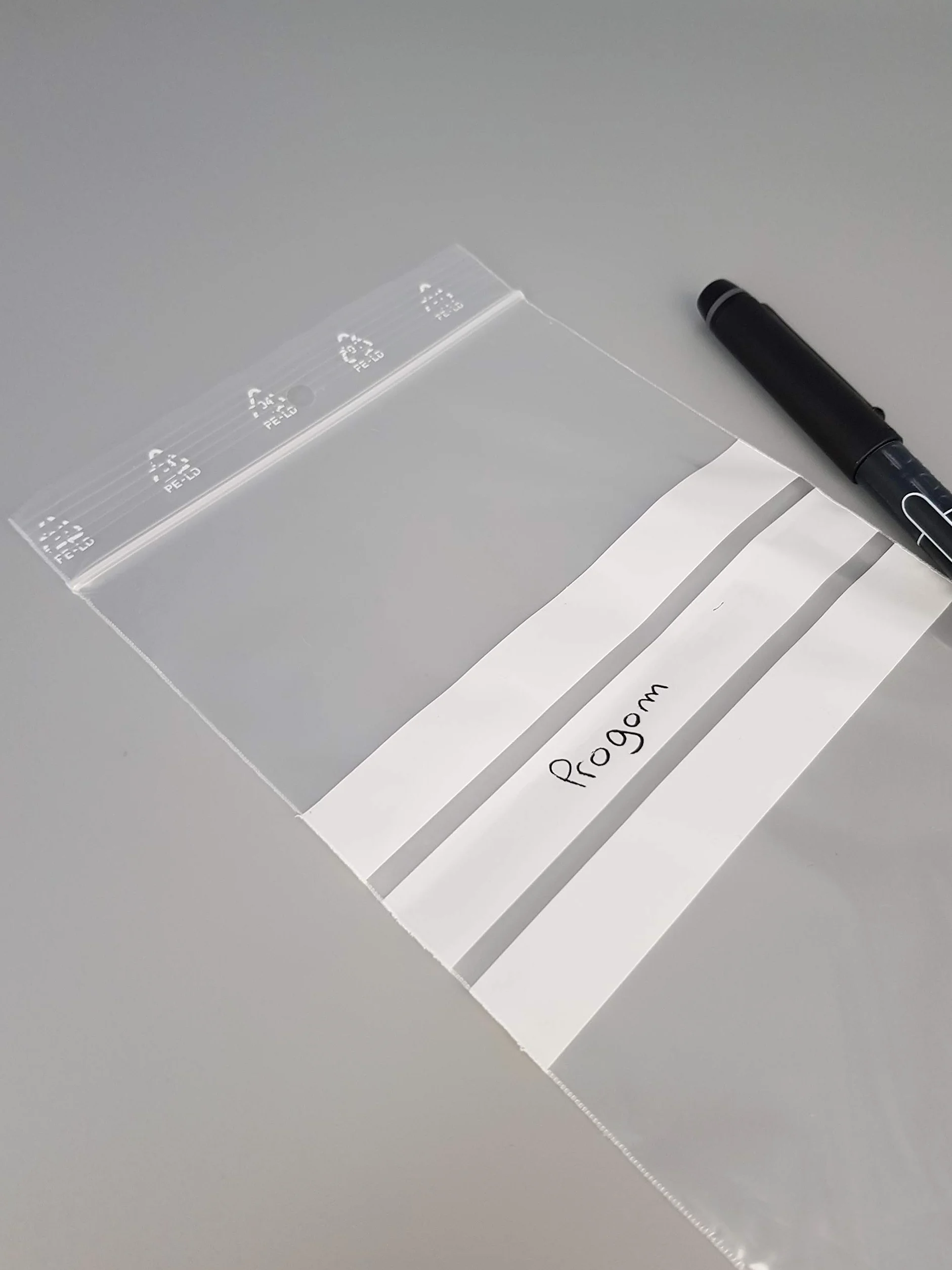 Bolsa con cierre zip y 3 tiras blancas, lote de 100, 50 micras (100 mm x 150 mm)