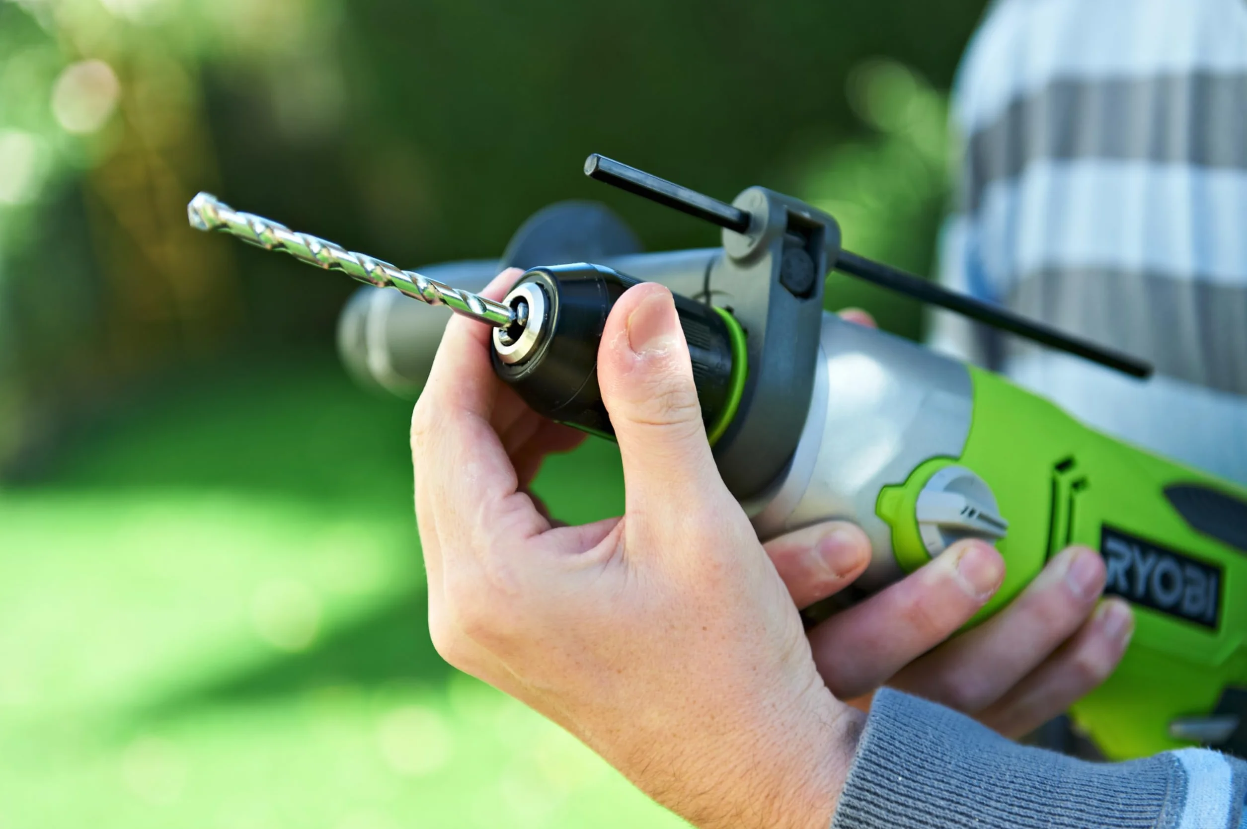 RYOBI - Taladro de Impacto con Cable 220V, 1200W - 2 Velocidades, Inversor de Rotación - Portabrocas 13mm de Autoapriete - Tope de Profundidad - LED - Mango Auxiliar con Portabrocas - RPD1200-K