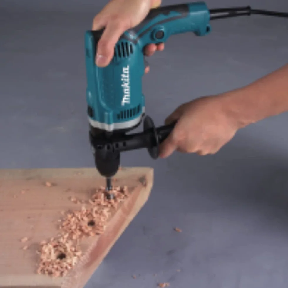 Makita HP1631K - Taladro Percutor 710W 1.9 Kg 3200 Rpm Portabrocas Auto
