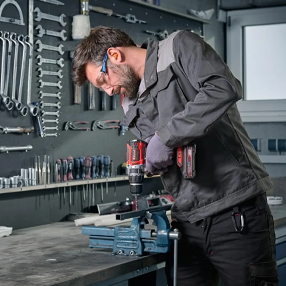 Einhell Professional Taladro percutor con batería TP-CD 18/70 Li-i BL Power X-Change (18 V, sin escobillas, 70 Nm, función de perforación por percusión 2x 2,0 Ah, cargador, E-Case)