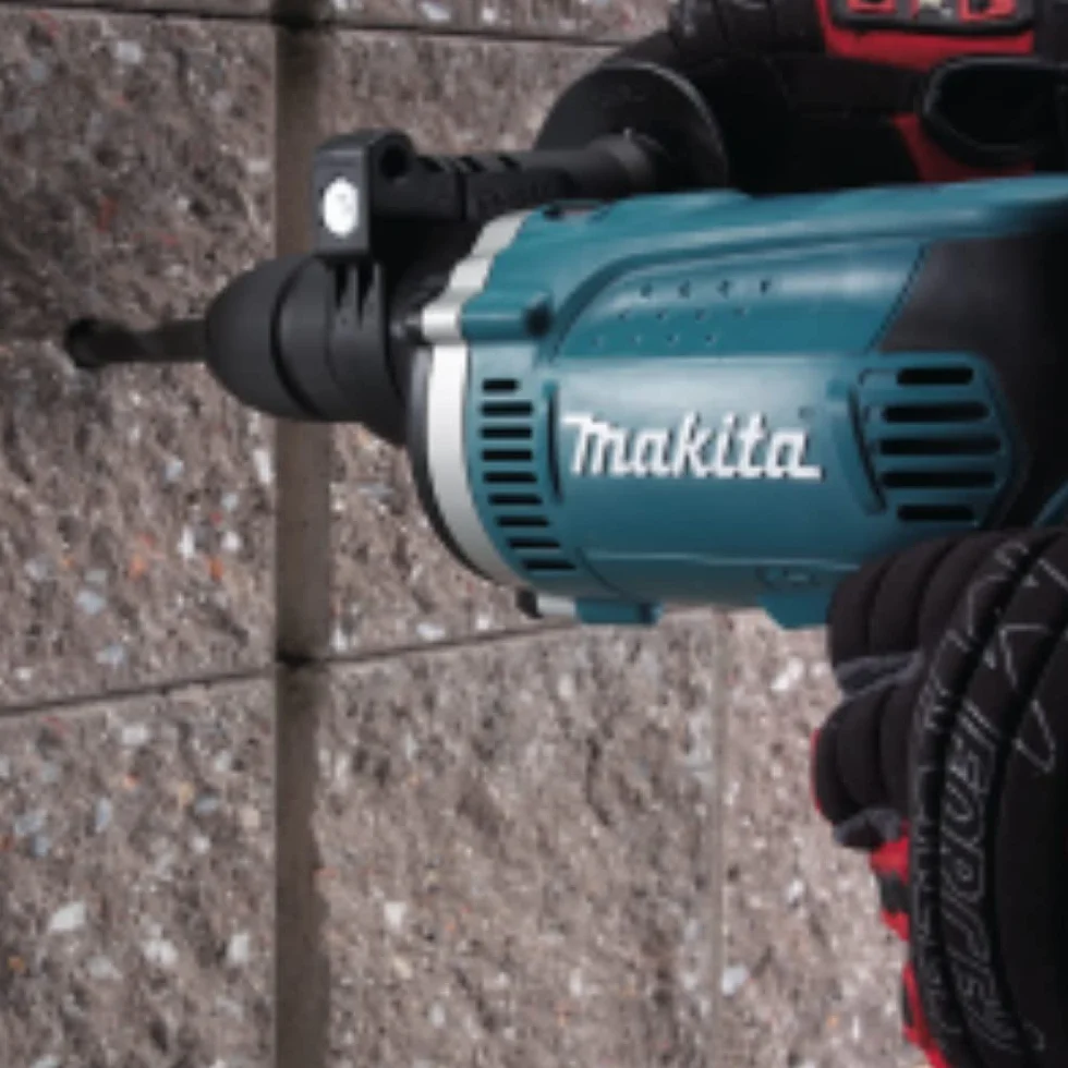 Makita HP1631K - Taladro Percutor 710W 1.9 Kg 3200 Rpm Portabrocas Auto